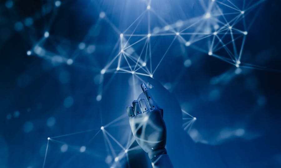 Developer working with code and data on multiple monitors